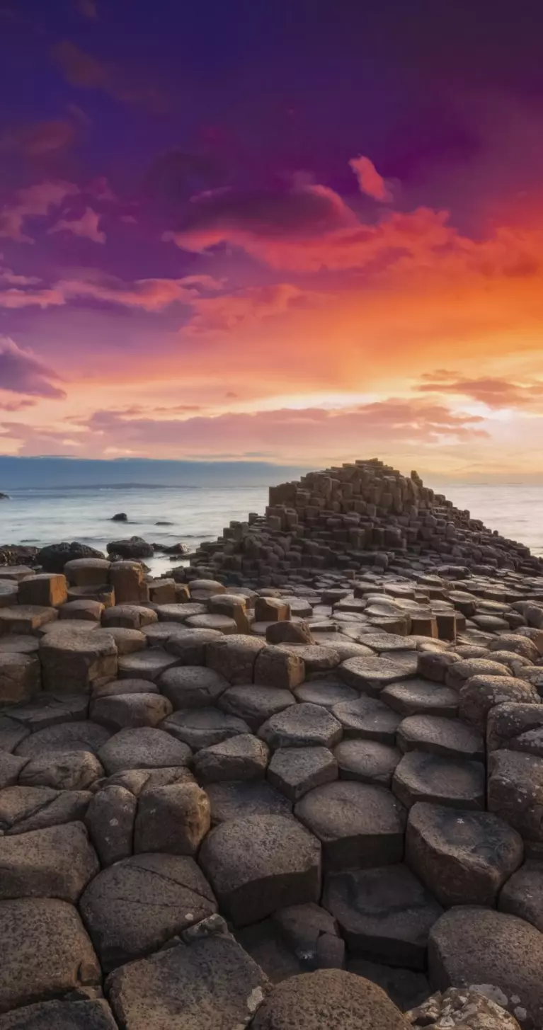 Colourful sunset at the Giant's Causeway Northern Ireland