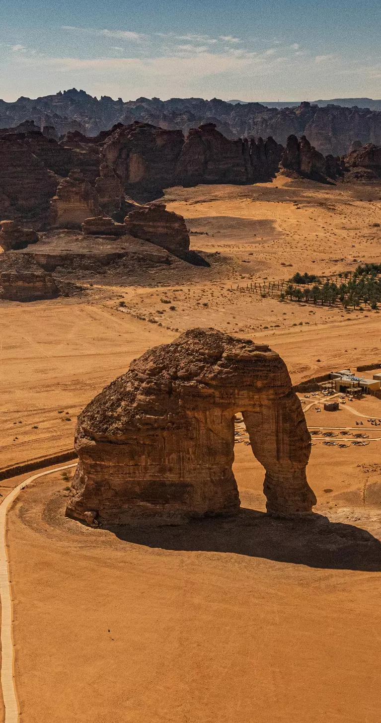 Aerial view of Elephant Rock (Jabal AlFil). From afar, this rock looks like an elephant with a ground-bound trunk.