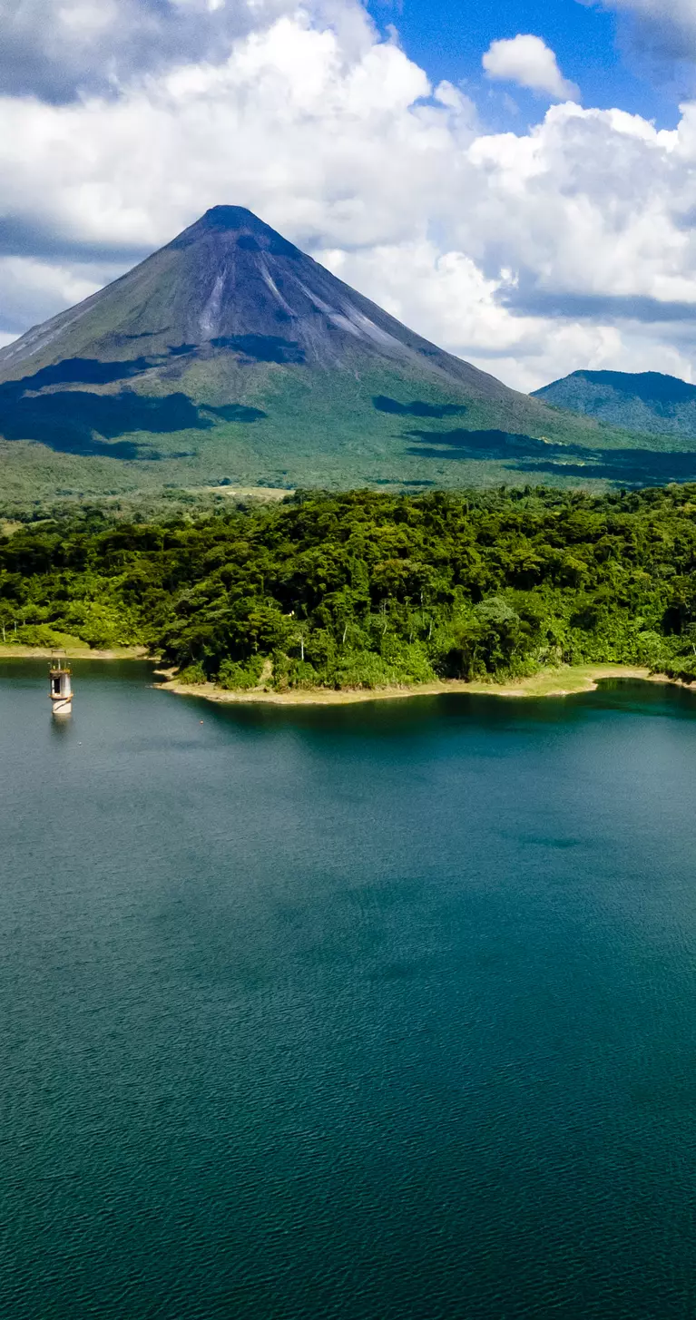 Arenal Lake sits at the base of the active Arenal Volcano.