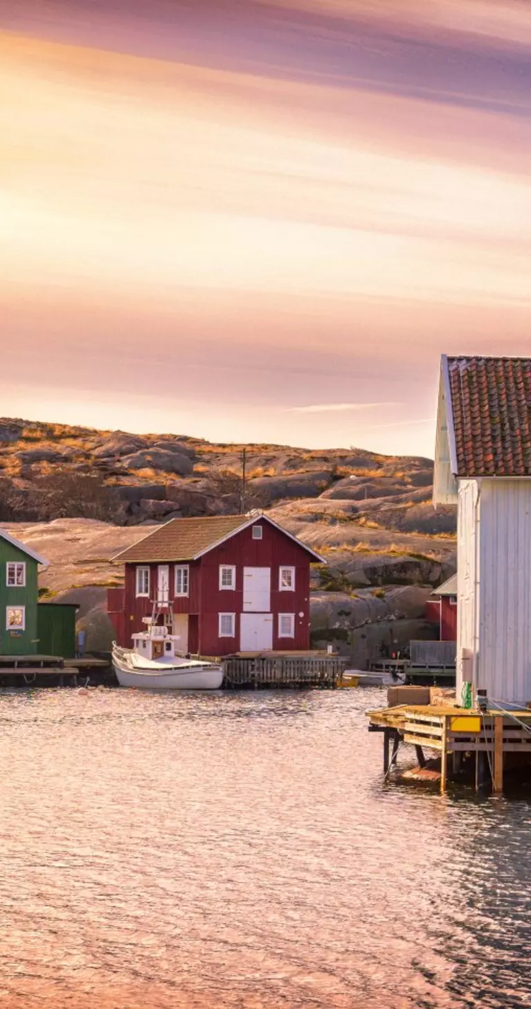 Beautiful landscape view of sunset and houses at Smogen