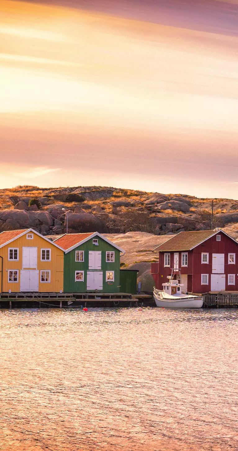 Beautiful landscape view of sunset and houses at Smogen