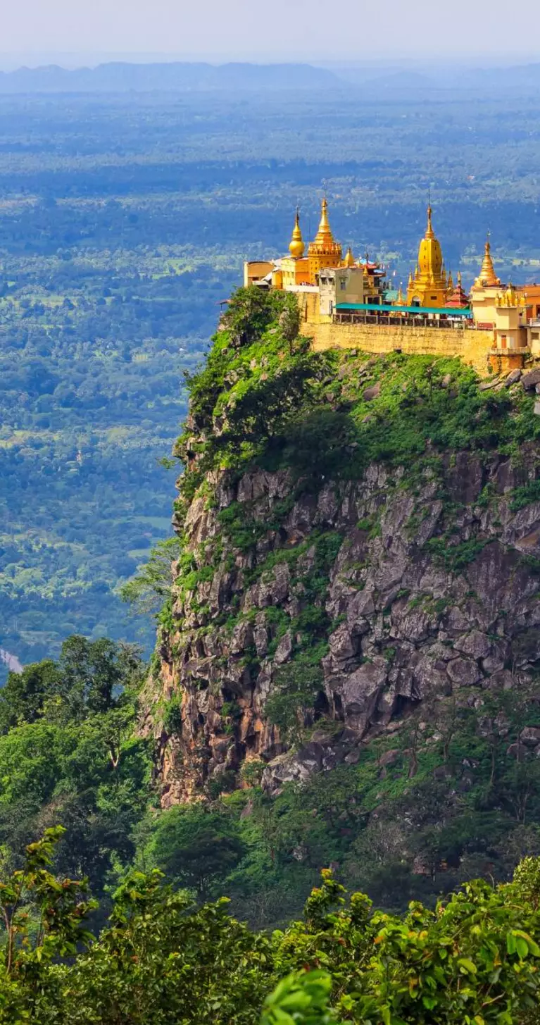 Built high on the volcanic plug of Mount Papa, Taung Kalat is a Buddhist monastery and temple