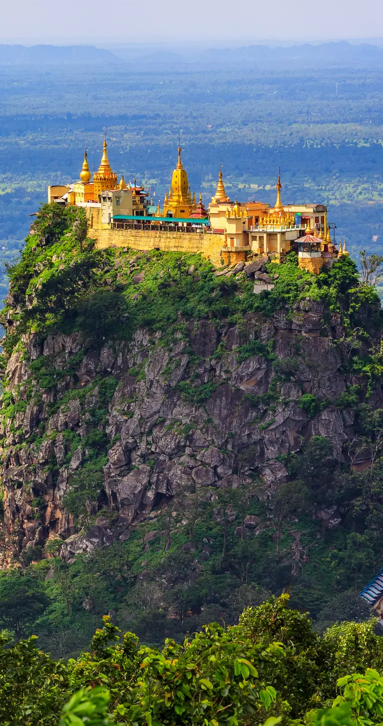 Built high on the volcanic plug of Mount Papa, Taung Kalat is a Buddhist monastery and temple