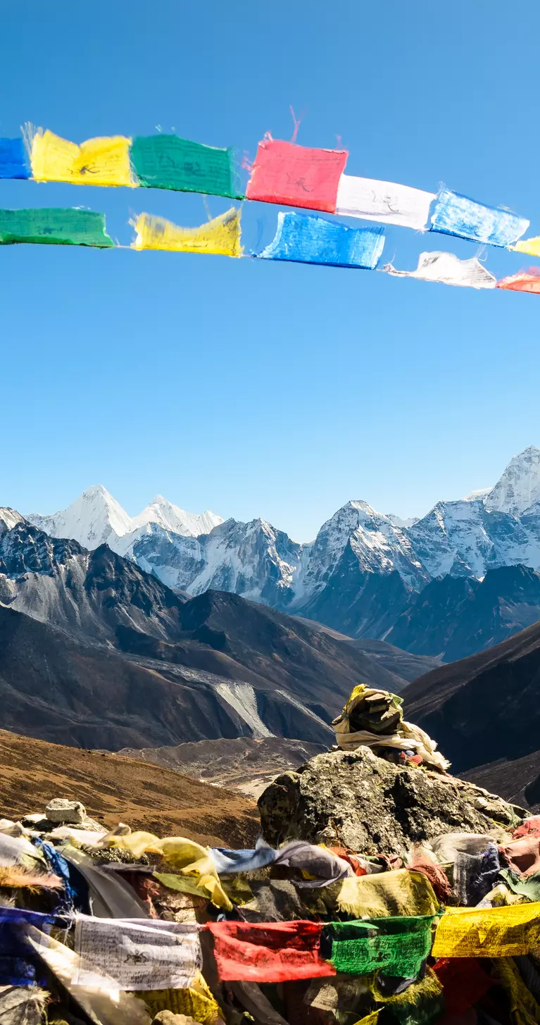 Ama Dablam mountain, framed with praying flags in Himalaya, Nepal.