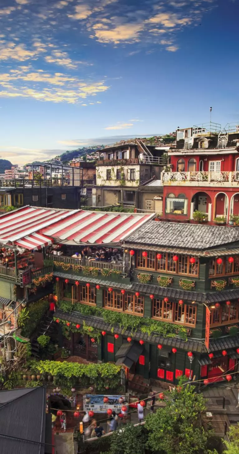 Evening view of hillside tea houses Jioufen village