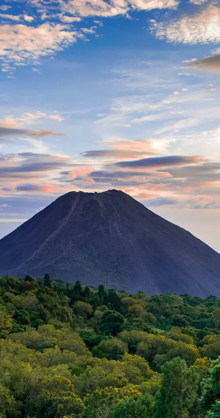 Izalco volcano rises up from the forest in El Salvador