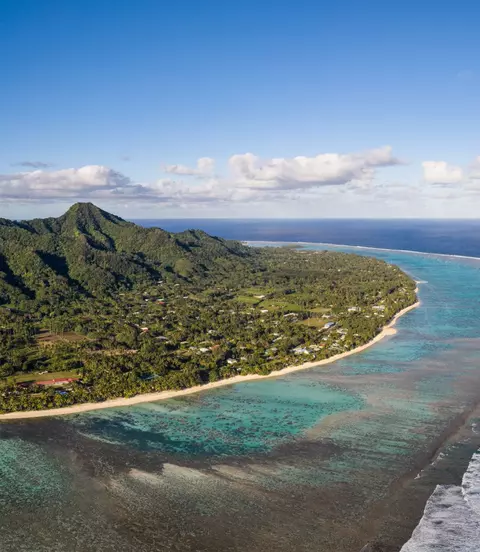 Rarotonga island, part of the Cook islands, in the Pacific ocean, with its jungle covered mountain and stunning beach