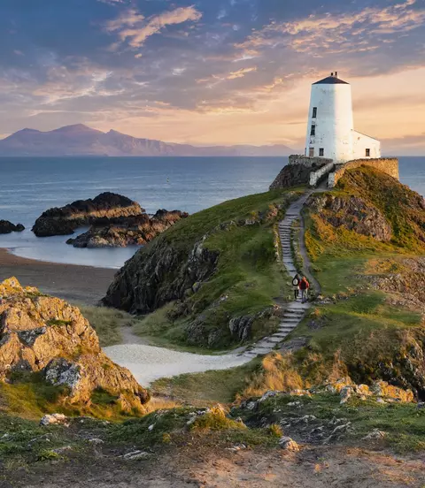 Tŵr Mawr lighthouse on Ynys Llanddwyn on Anglesey, Wales, marks the western entrance to the Menai Strait