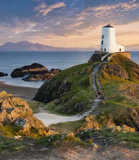 Tŵr Mawr lighthouse on Ynys Llanddwyn on Anglesey, Wales, marks the western entrance to the Menai Strait