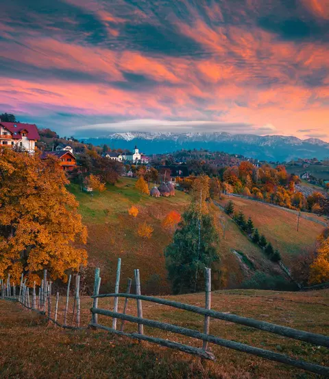 Spectacular autumn rural scenery at sunset, Magura mountain village in the Carpathians, Romania