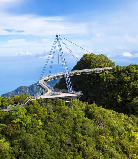 Amazing cable bridge over the tropical rainforest island landscape