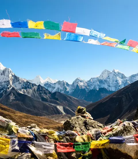 Ama Dablam mountain, framed with praying flags in Himalaya, Nepal.