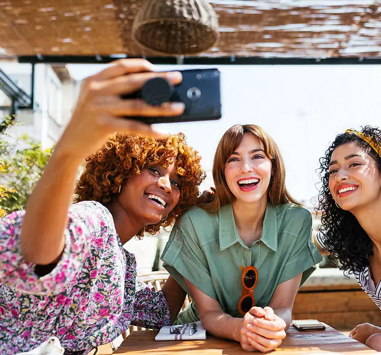 female friends taking a photo together