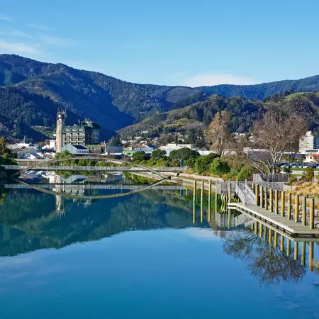 Panorama of Nelson City, reflected in the Maitai River, New Zealan