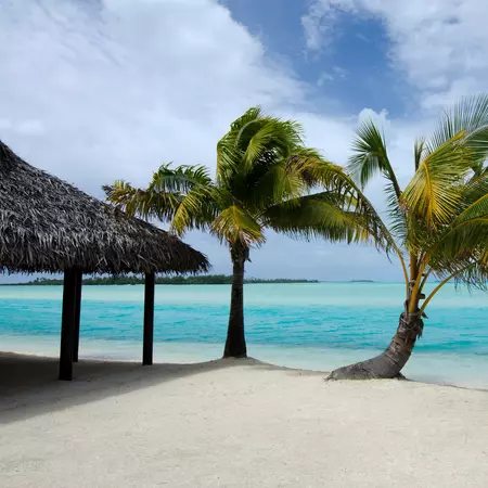 Beach bungalow on tropical pacific ocean Island