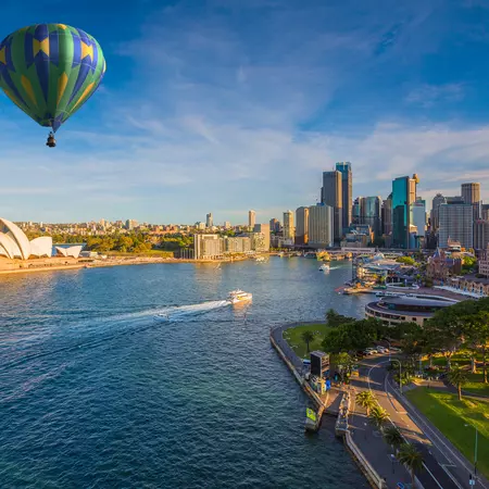 Hot air balloon over Sydney bay in evening, Sydney, Australia