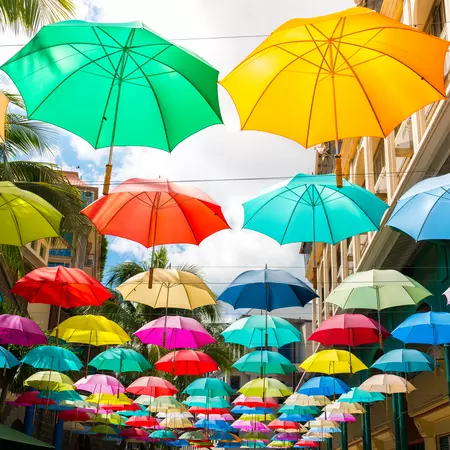 Multicolored umbrellas in le caudan waterfront, port louis capital of mauritius