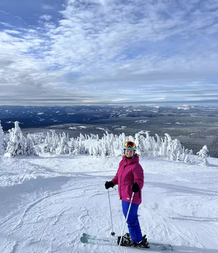 Candica Deba skiing in the winter