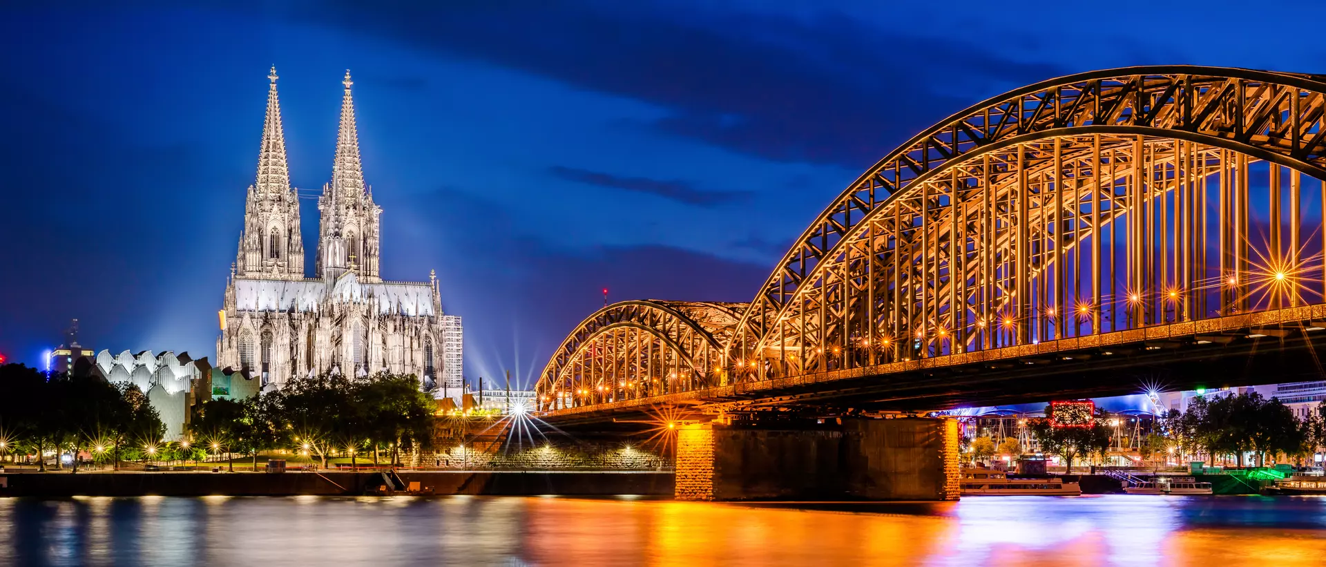 Cologne with Cologne Cathedral, Rhine and Hohenzollern Bridge at night