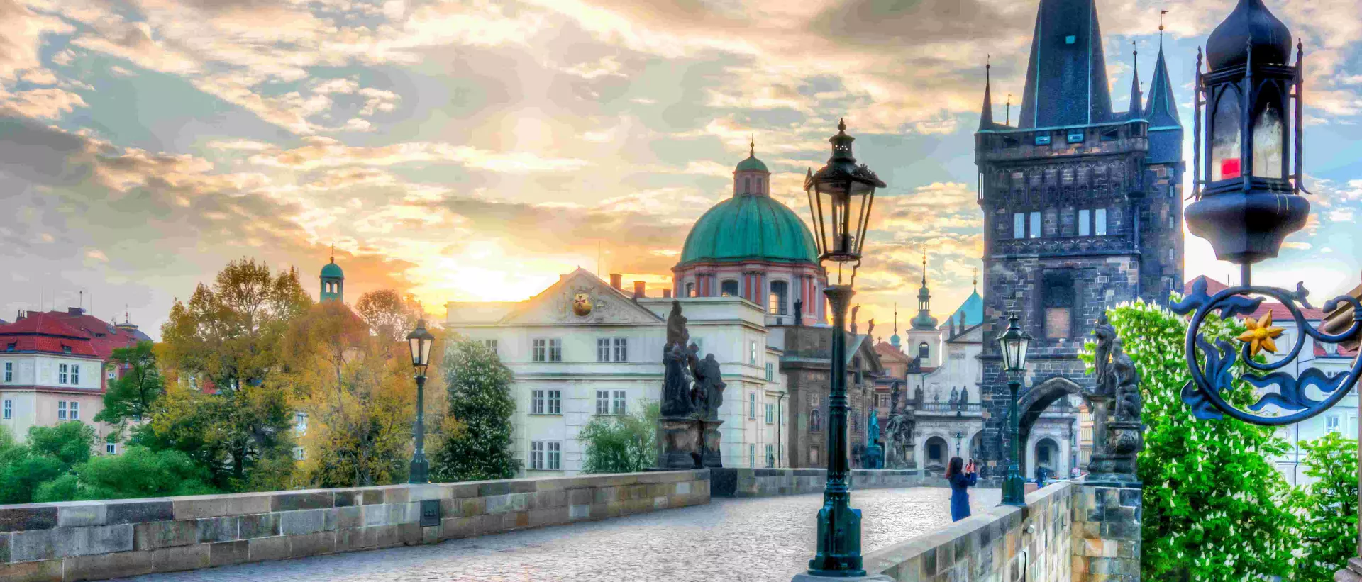 Charles Bridge (Karluv Most) at sunrise in Prague.