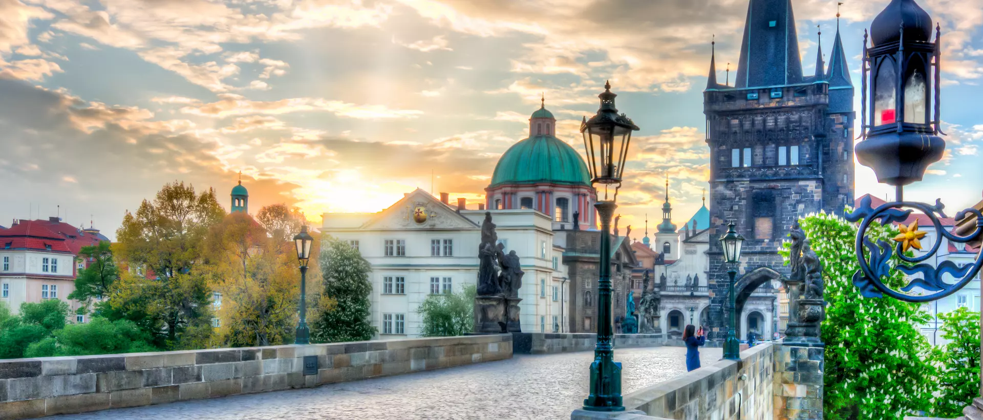 Charles Bridge (Karluv Most) at sunrise in Prague.