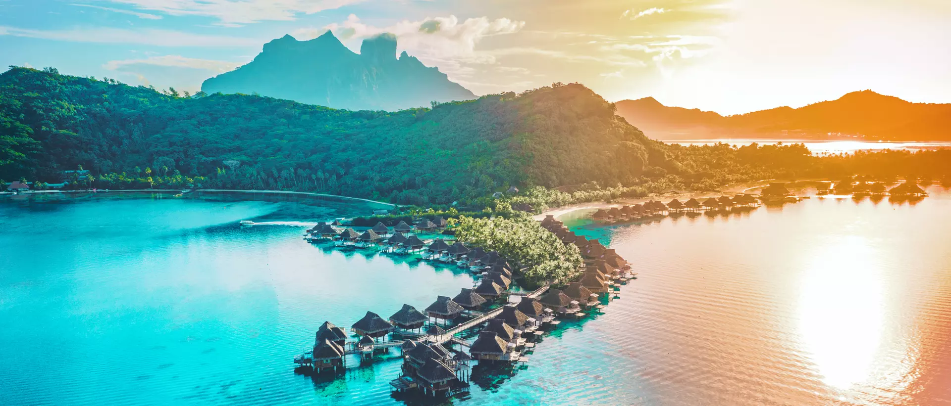 View from above at sunset of Bora Bora overwater bungalows, French Polynesia, Tahiti.