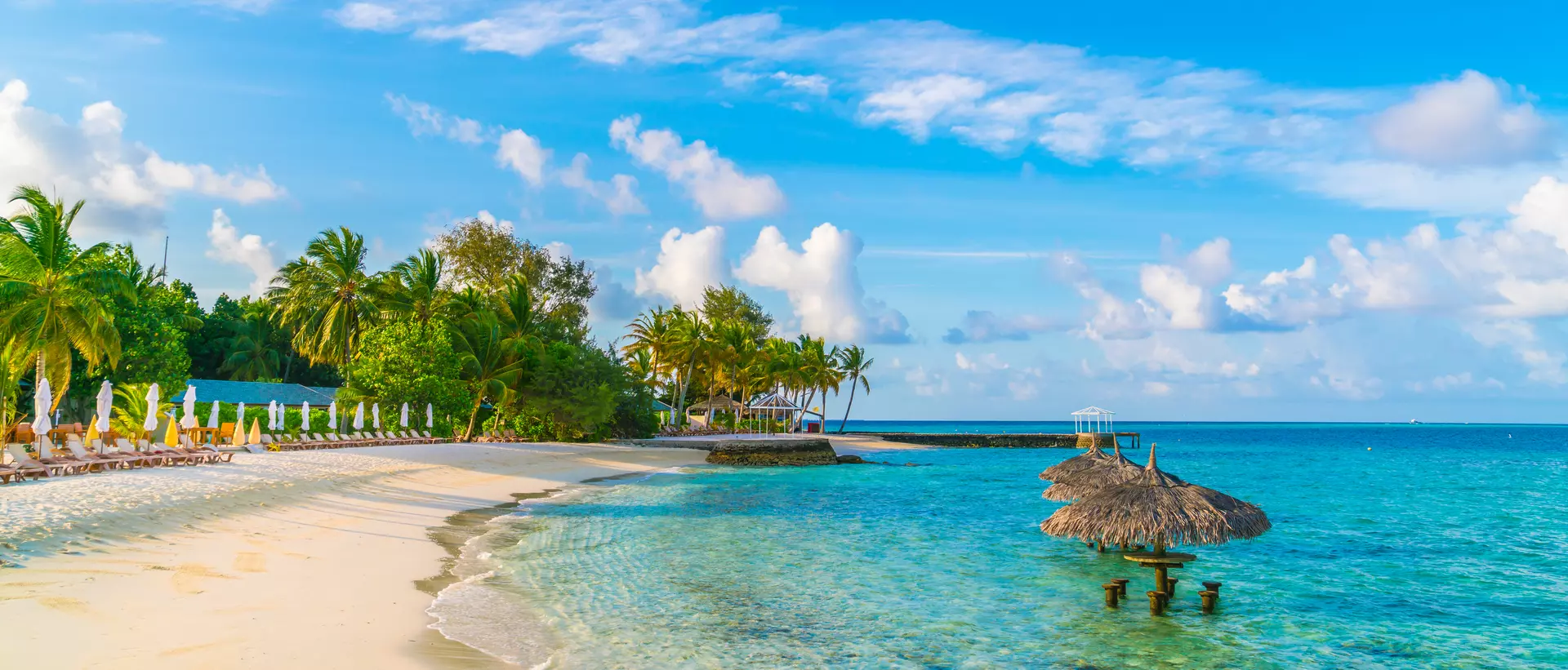 Beautiful tropical Maldives island with white sandy beach and sea