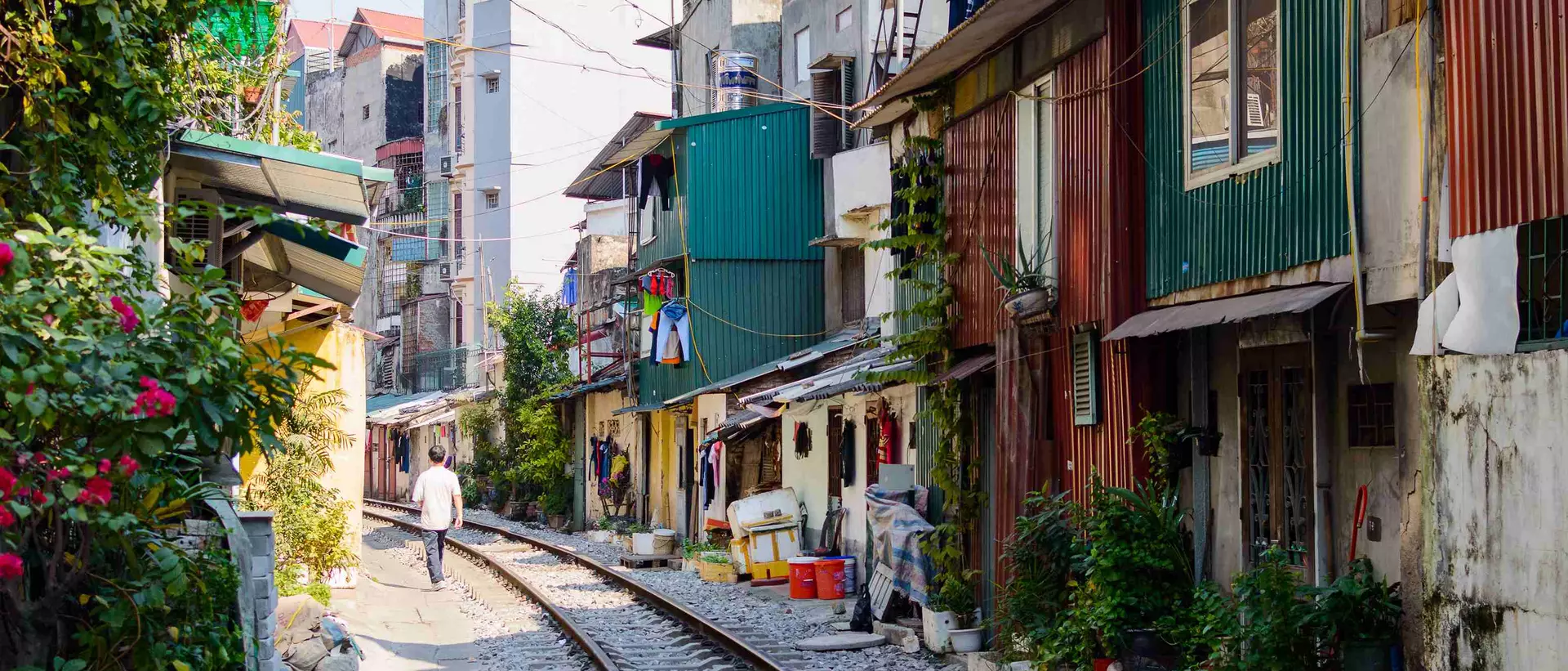 Railroad tracks on a street in the center of Hanoi, Vietnam.