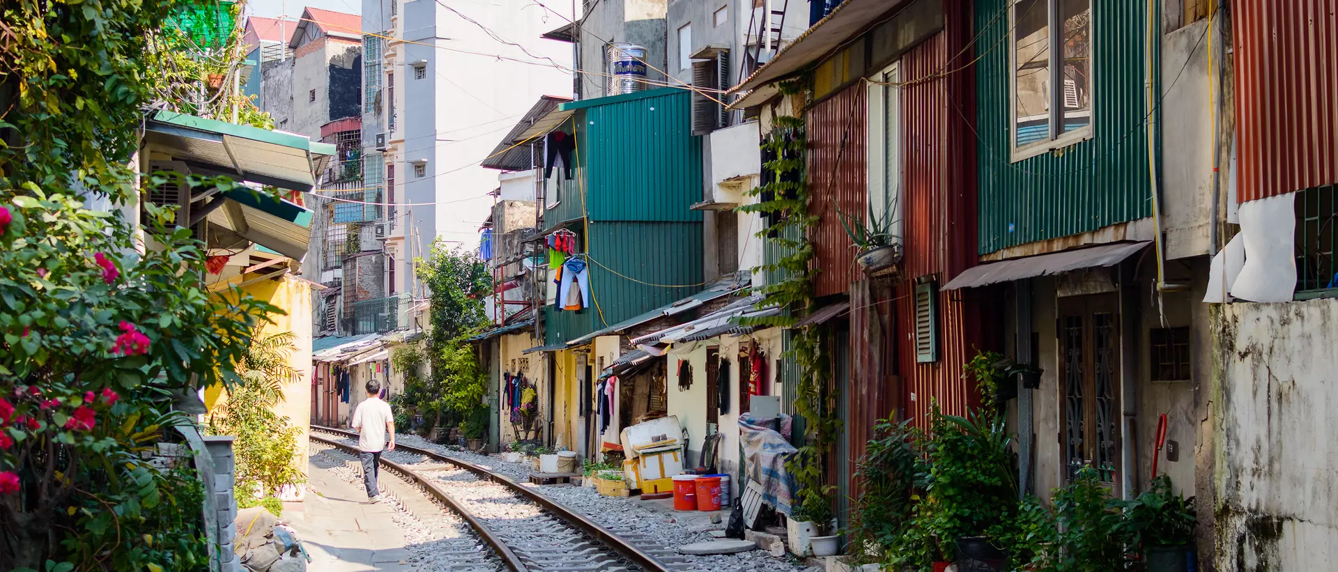 Railroad tracks on a street in the center of Hanoi, Vietnam.