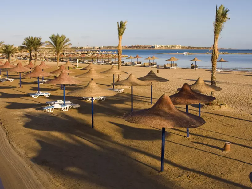Beach umbrella on the shore of the Red Sea