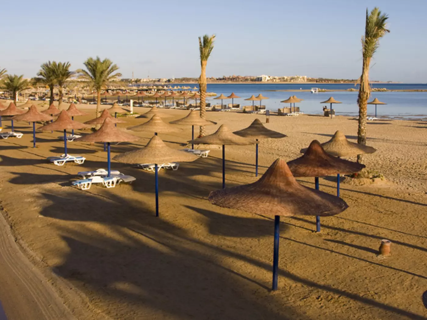 Beach umbrella on the shore of the Red Sea