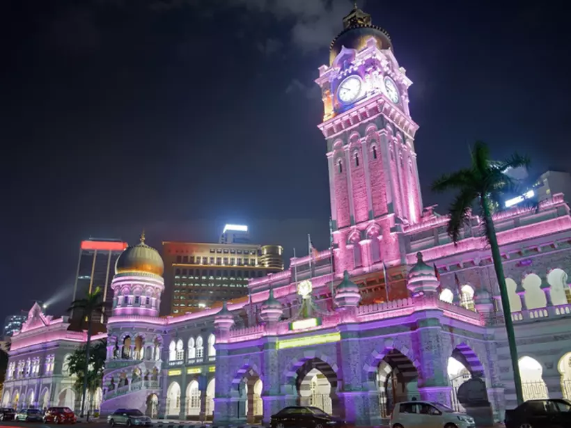 Colorful city night with famous landmark Sultan Abdul Samad Building