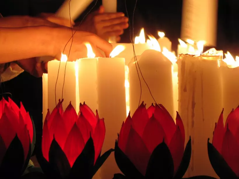Lighting Candles on Buddhas Birthday