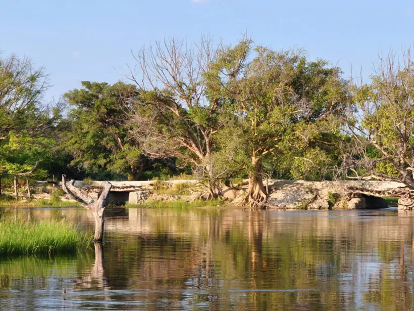 The old bridge over Thamalakane River near Maun is a photo stop while on your Botswana safari.