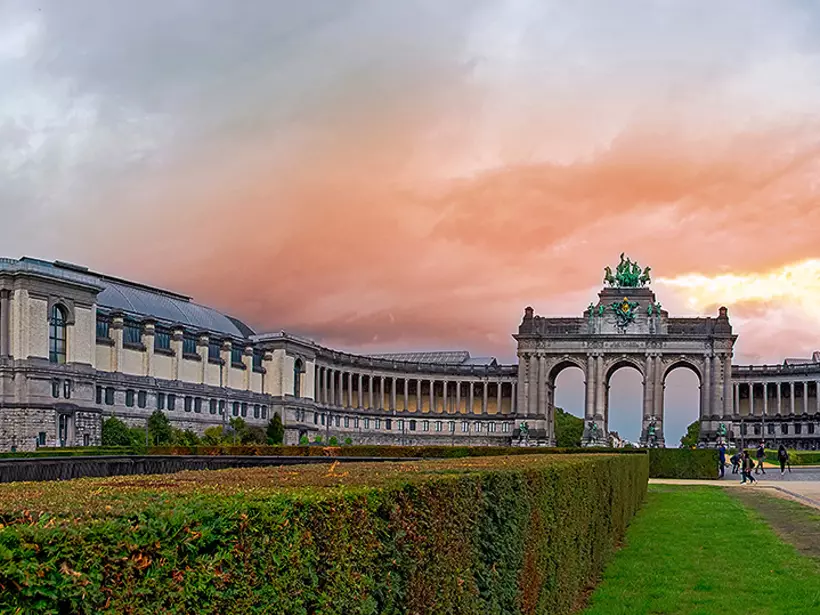 Enjoy the beauty of the outdoors while strolling through Parc du Cinquantenaire