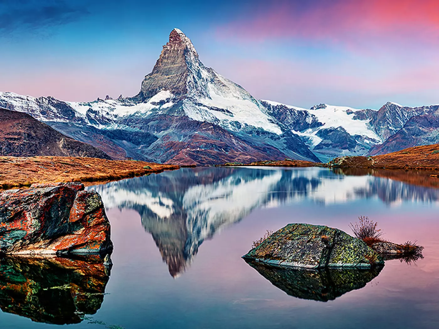 Capture the beauty of the Matterhorn reflecting against the stunning clarity of Stellisee Lake
