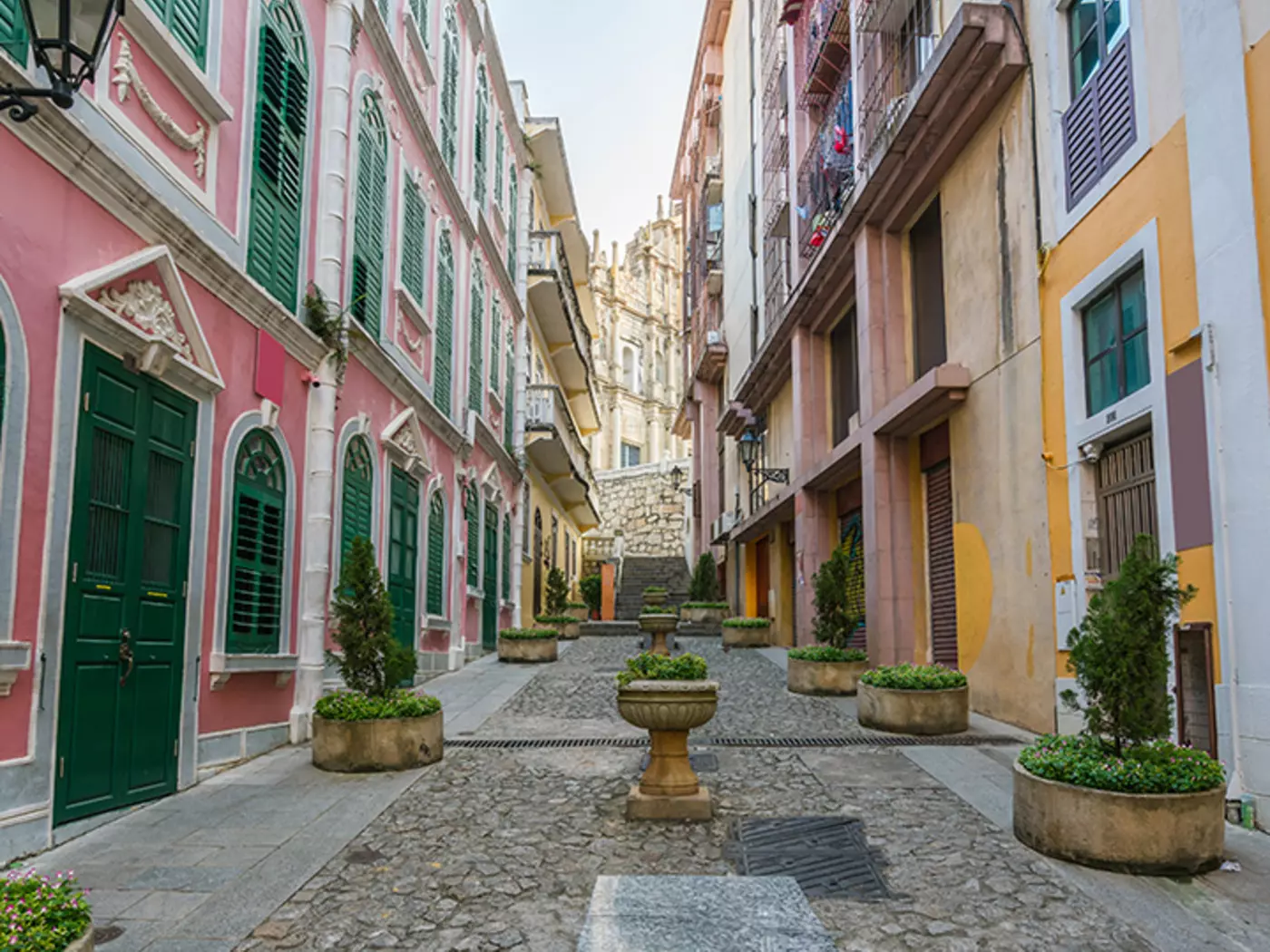 Admire the colourful streets of Macau as you wander and explore the area
