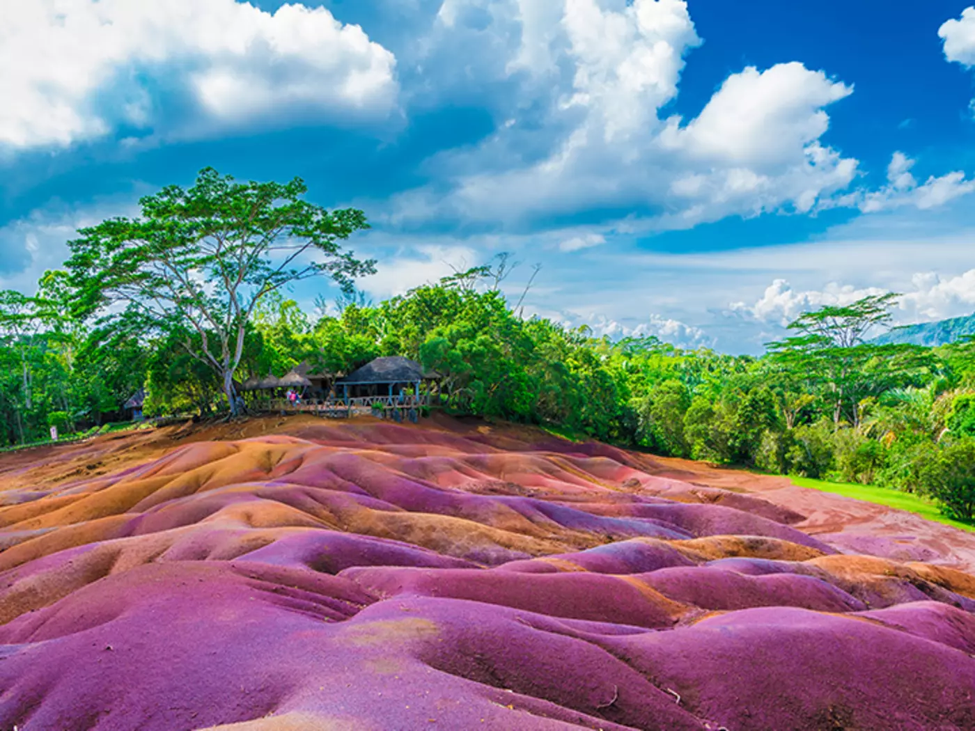 Capture the vibrant colours of the 7 Coloured Earth, a paradise layered with sensational shades of soil Capture the vibrant colours of the 7 Coloured Earth, a paradise layered with sensational shades of soil