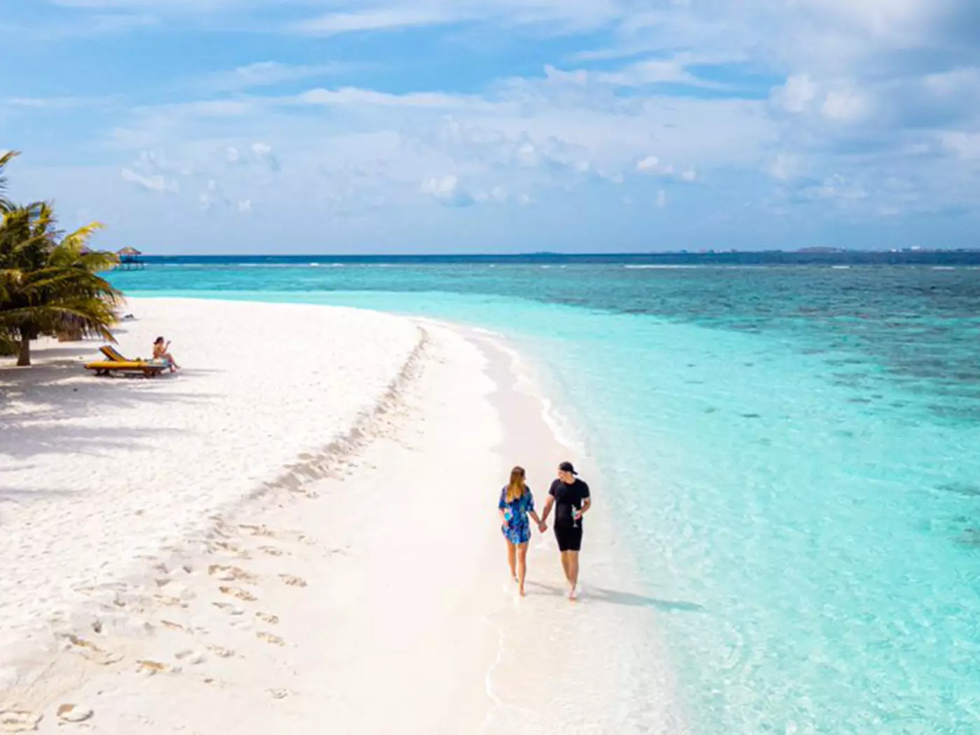 Bask in the sun on the white-sand beaches and clear blue waters of the Adaaran Prestige Vadoo