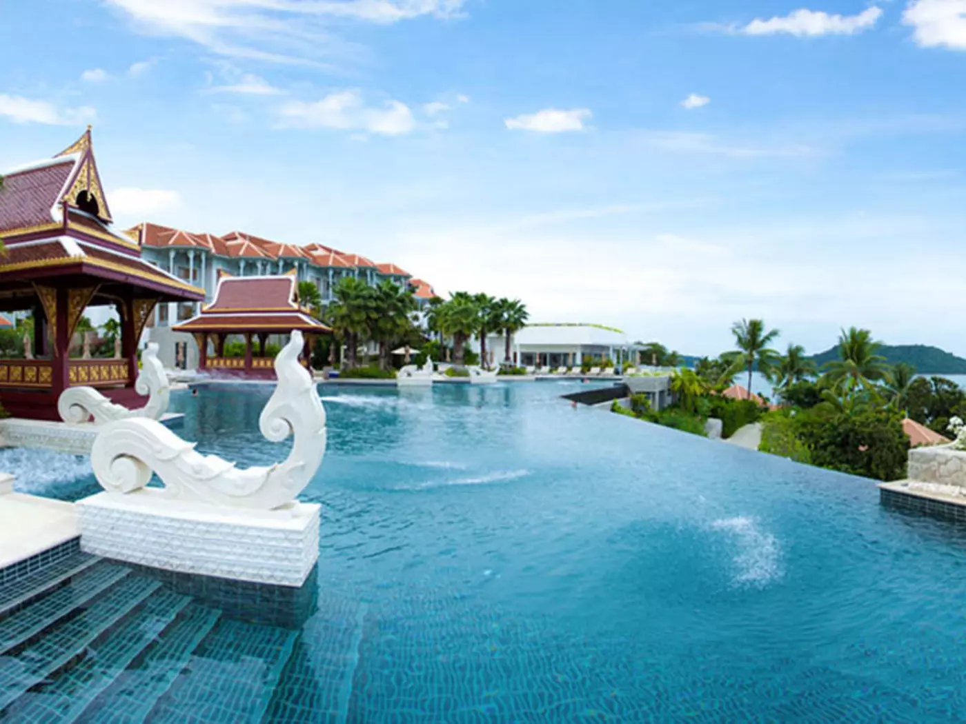 Enjoy a dip in the pool at the Amatara Welleisure Resort during your Thailand vacation