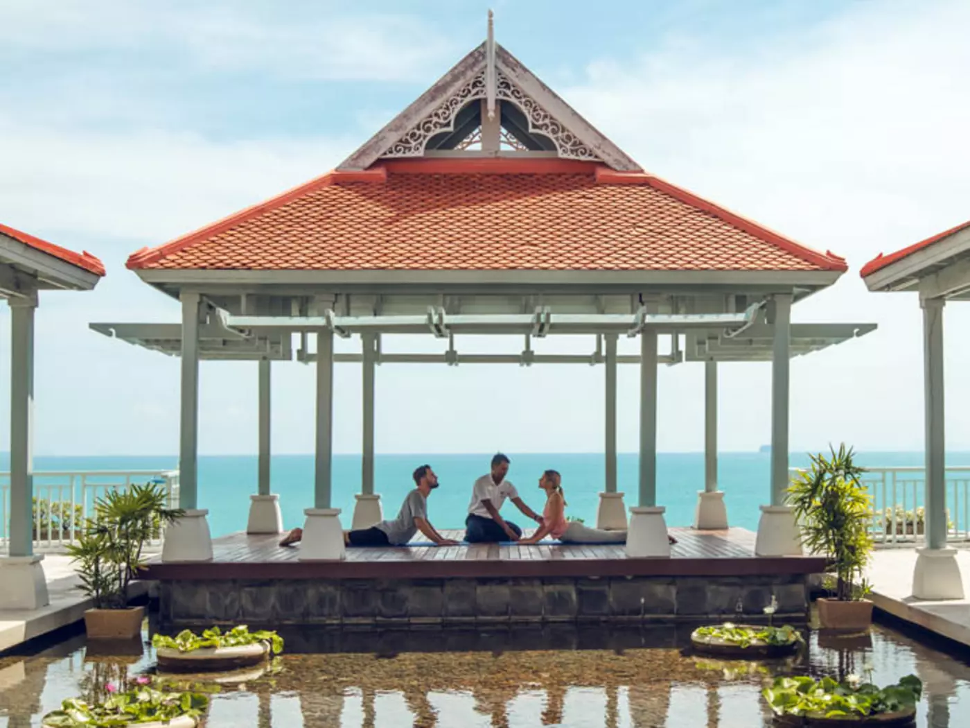 Experience maximum tranquility as you enage in a yoga session by the ocean at the Amatara Welleisure Resort