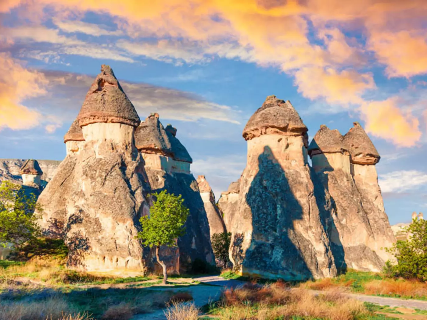 Cappadocia, in central Türkiye, is famous for its fairytale scenery, cave dwellings and remarkable rock formations