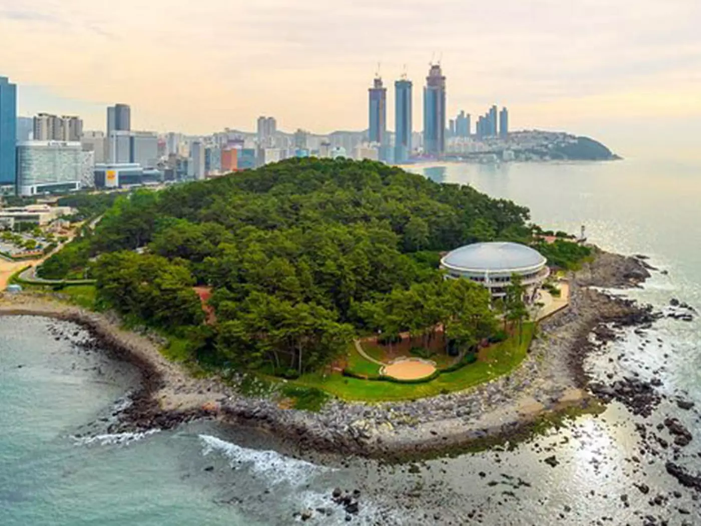 The incredible Dongbaekseom Island is an island located off one end of Busan's famous Haeundae Beach