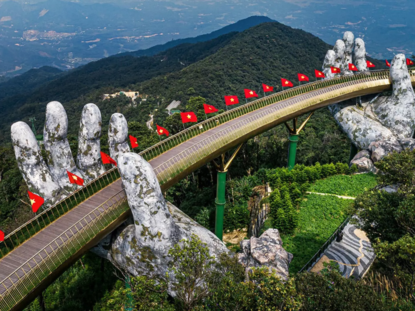 The two hands supporting the Golden Bridge symbolize the hands of God