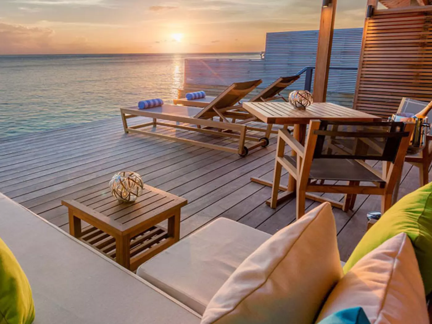 Experience tranquility as you relax in the comfort of your ocean villa at Hurawalhi Island Resort