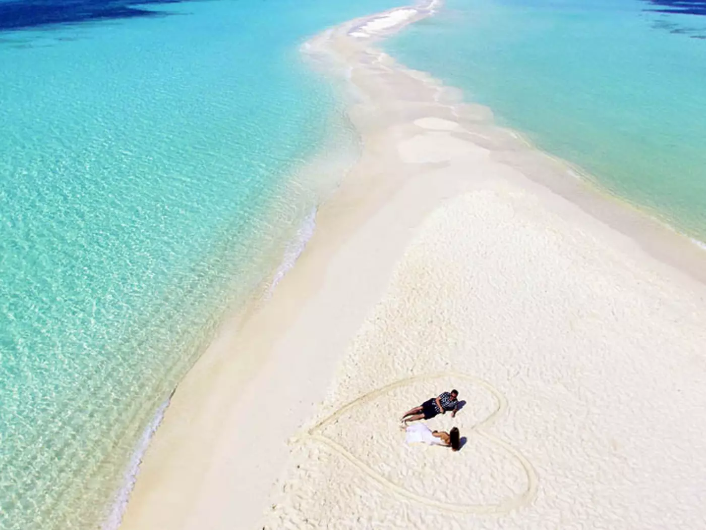 Enjoy the crystal clear waters and white sand beaches at the luxurious Kuredu Island Resort