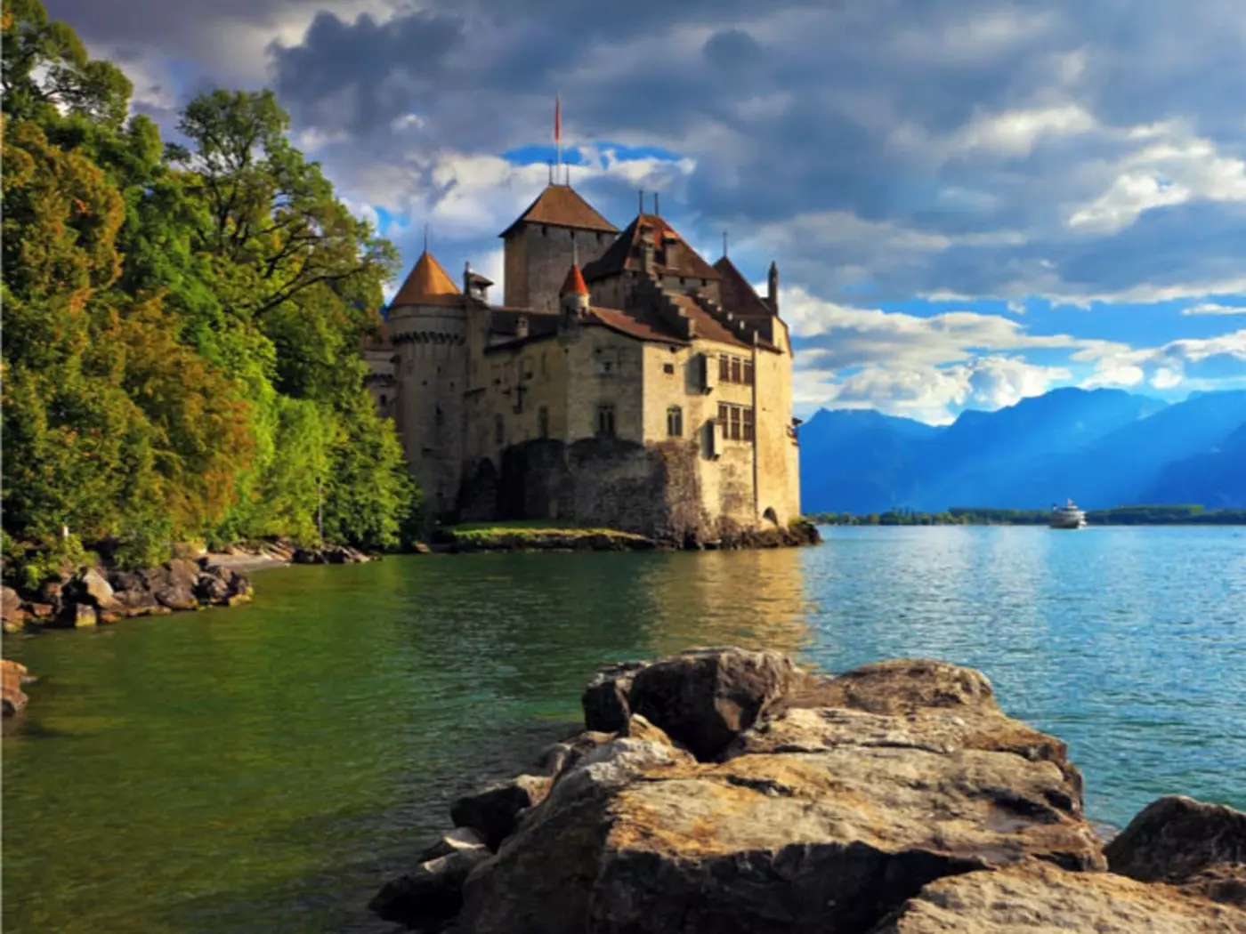 Montreux, nestled in a sheltered bay on Lake Geneva is surrounded by vineyards and the snow-covered Alps
