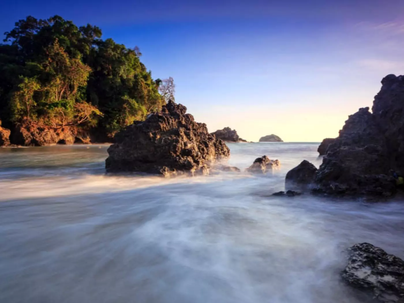The beaches of Manuel Antonio are singularly gorgeous with stunning, brightly-colored sunsets