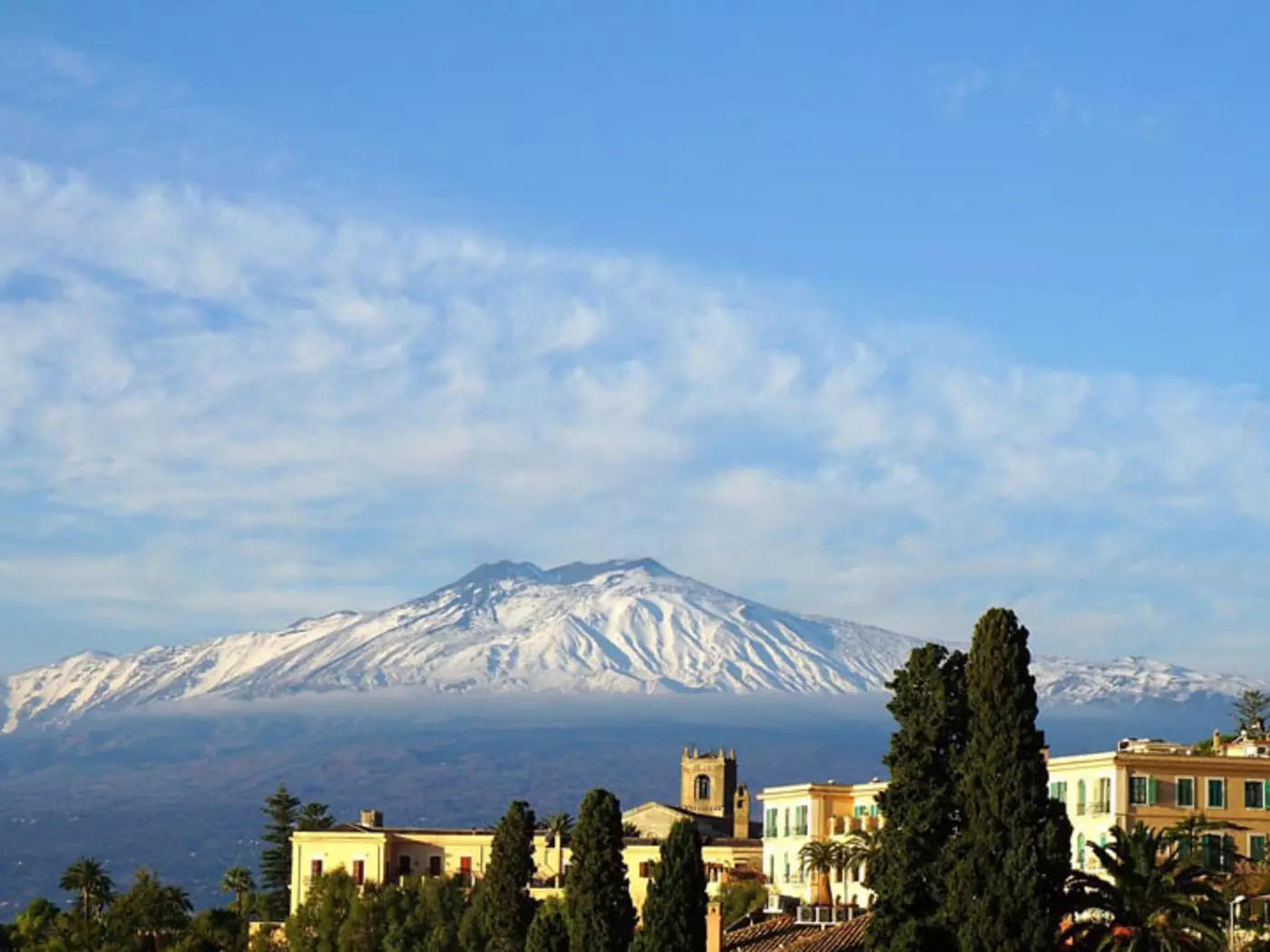 Mount Etna is the highest and most active volcano in Europe. Towering above the city of Catania