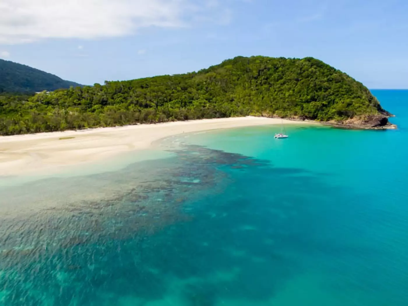 A breathtaking view of the crystal clear waters of Myall beach at Cape Tribulation